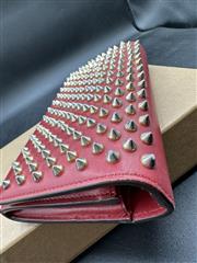 CHRISTIAN LOUBOUTIN POCHETTE WRISTLET